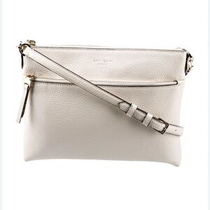 - Kate Spade New York Soft Leather Crossbody Bag in Cream-